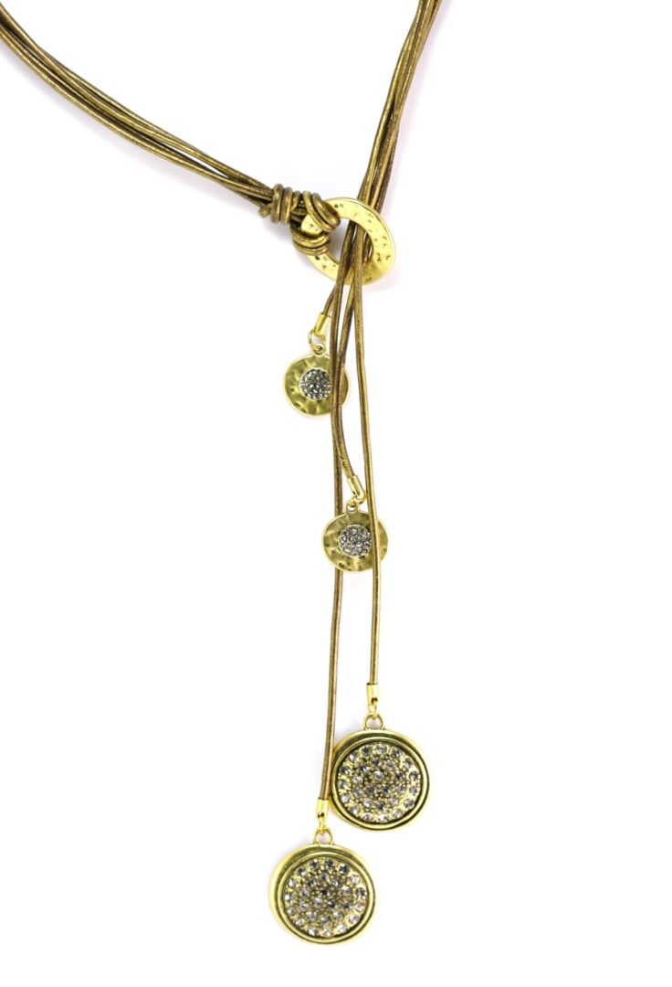 Gold pendant necklace with multiple circular charms on white background.