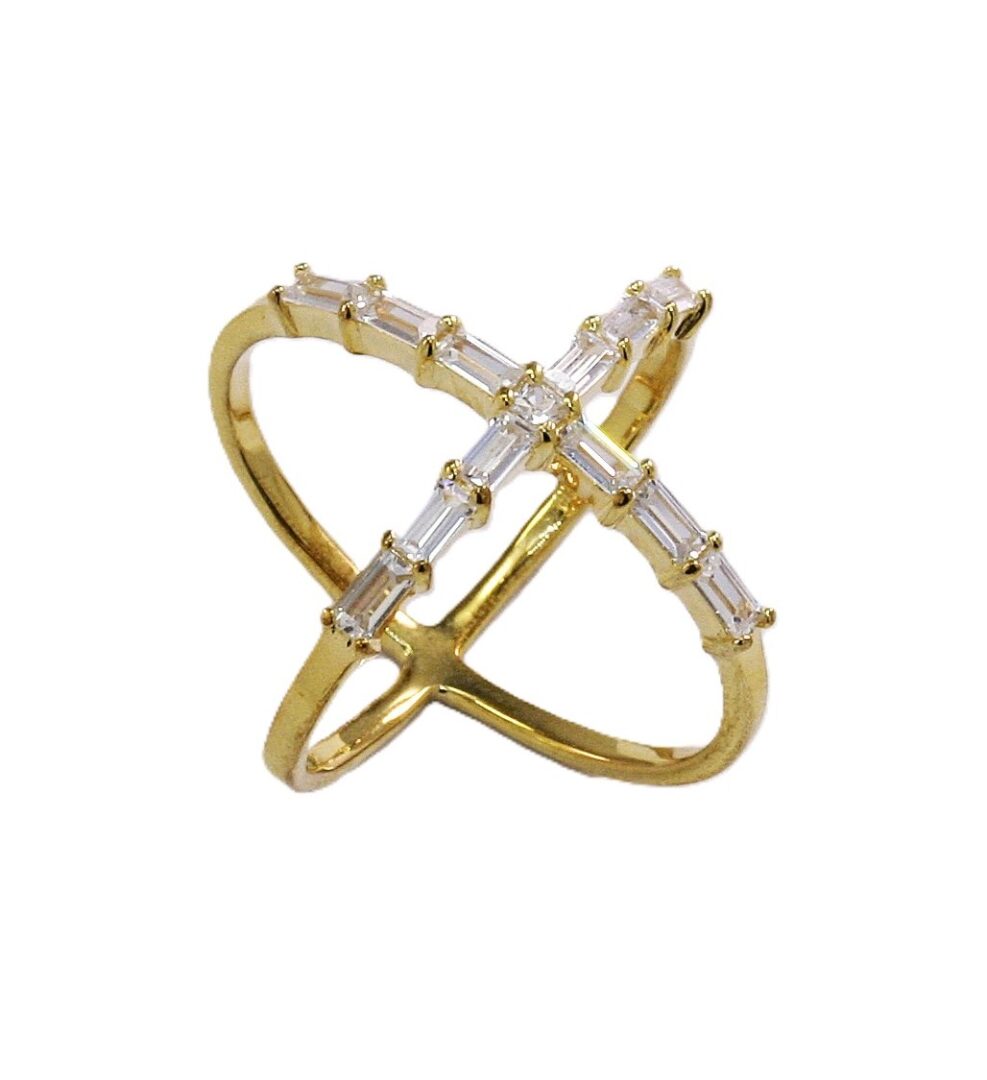 Elegant gold ring with intersecting bands and baguette diamonds.