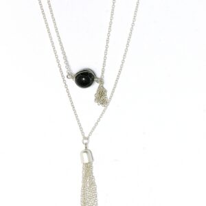 Elegant layered silver necklaces with a black stone and tassel pendants.