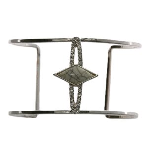 Silver cuff bracelet with a diamond-shaped centerpiece.