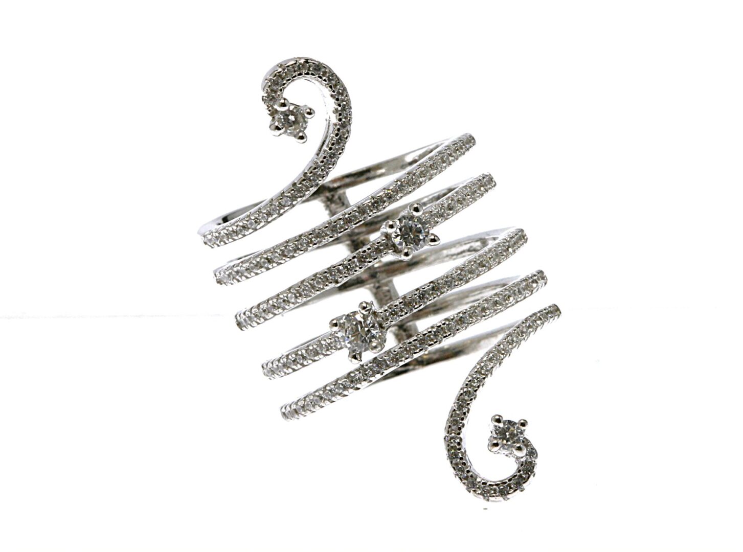 Elegant silver coil ring with embedded sparkling stones.