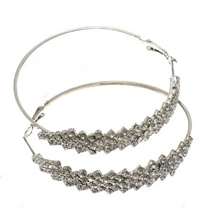 Silver hoop earrings with intricate bead detailing.