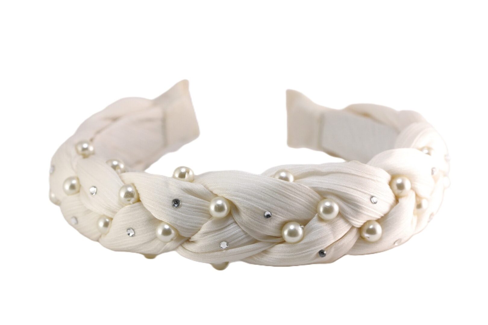 White braided headband adorned with pearls and a bow.