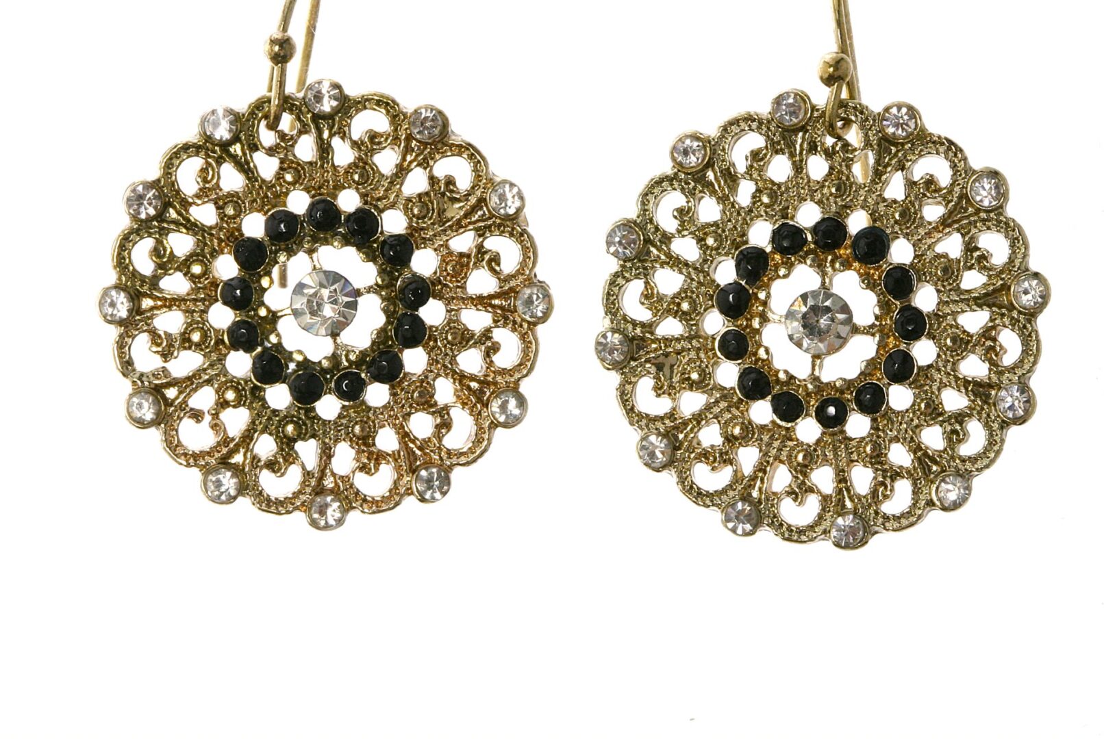 Intricate gold filigree earrings with a circular floral design.