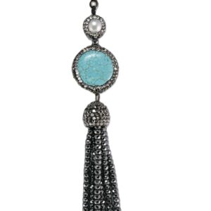Elegant pendant with turquoise stone and silver tassel.
