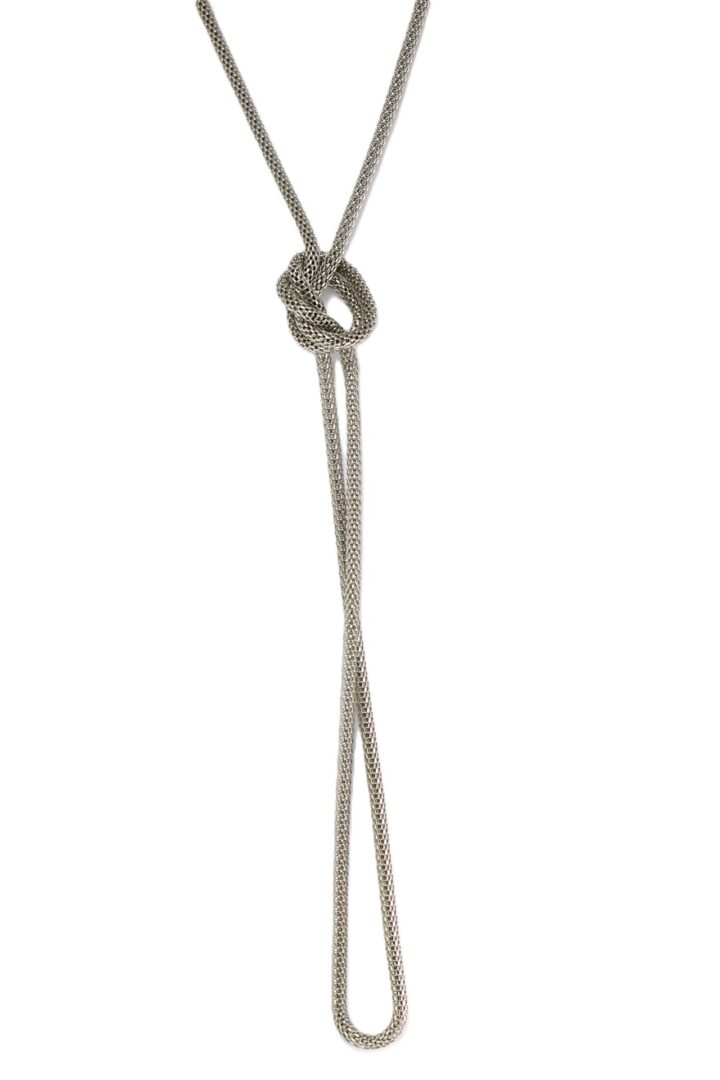 A silver pendant necklace with a knot design on a white background.