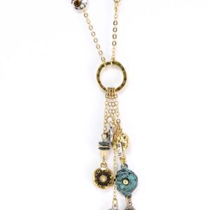 Elegant gold necklace with multiple charm pendants including a watch and flower.