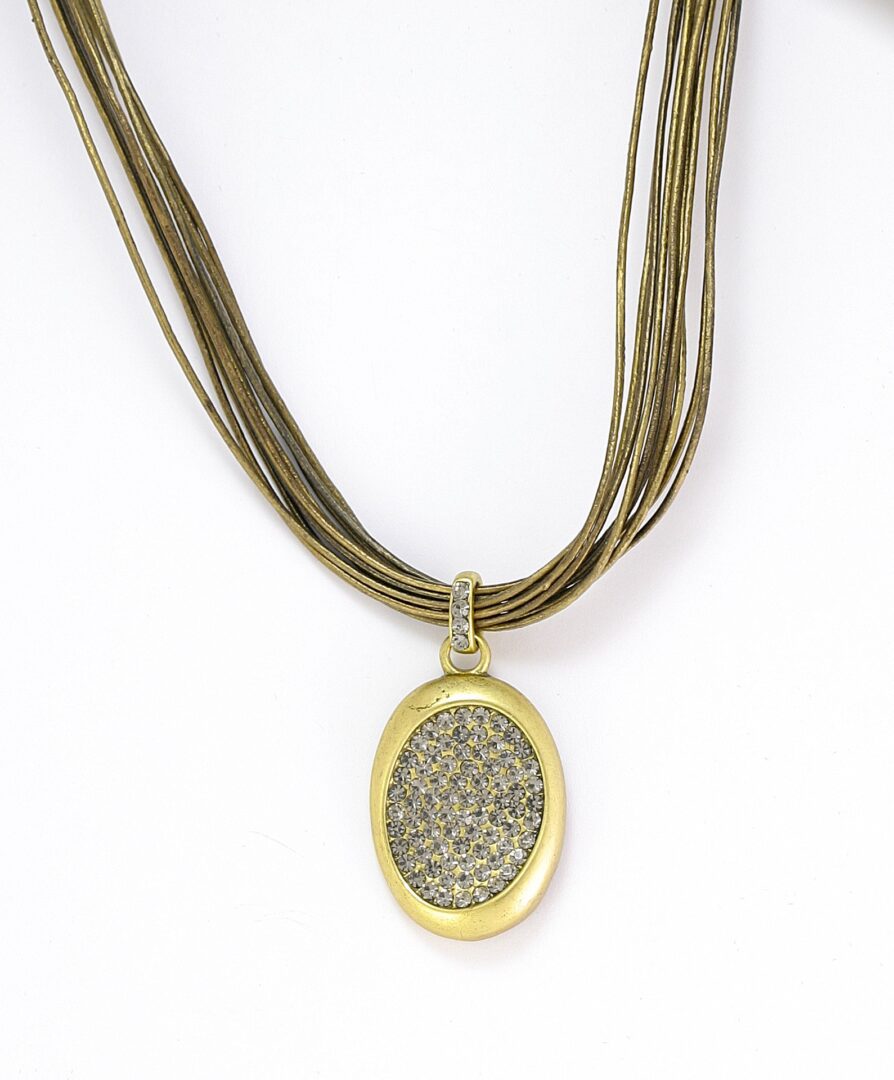 Elegant oval pendant necklace with a multi-strand cord.