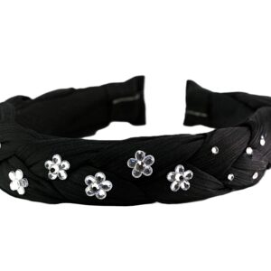 Black fabric headband with decorative flower embellishments.
