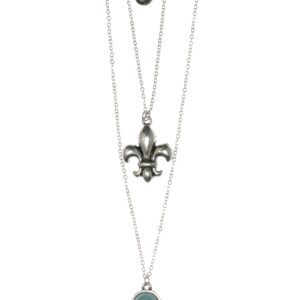 Layered silver necklaces with fleur-de-lis and turquoise pendants.
