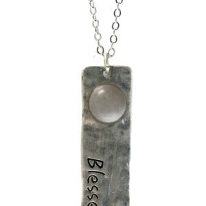 Silver pendant with 'Blessed' inscription on a chain.
