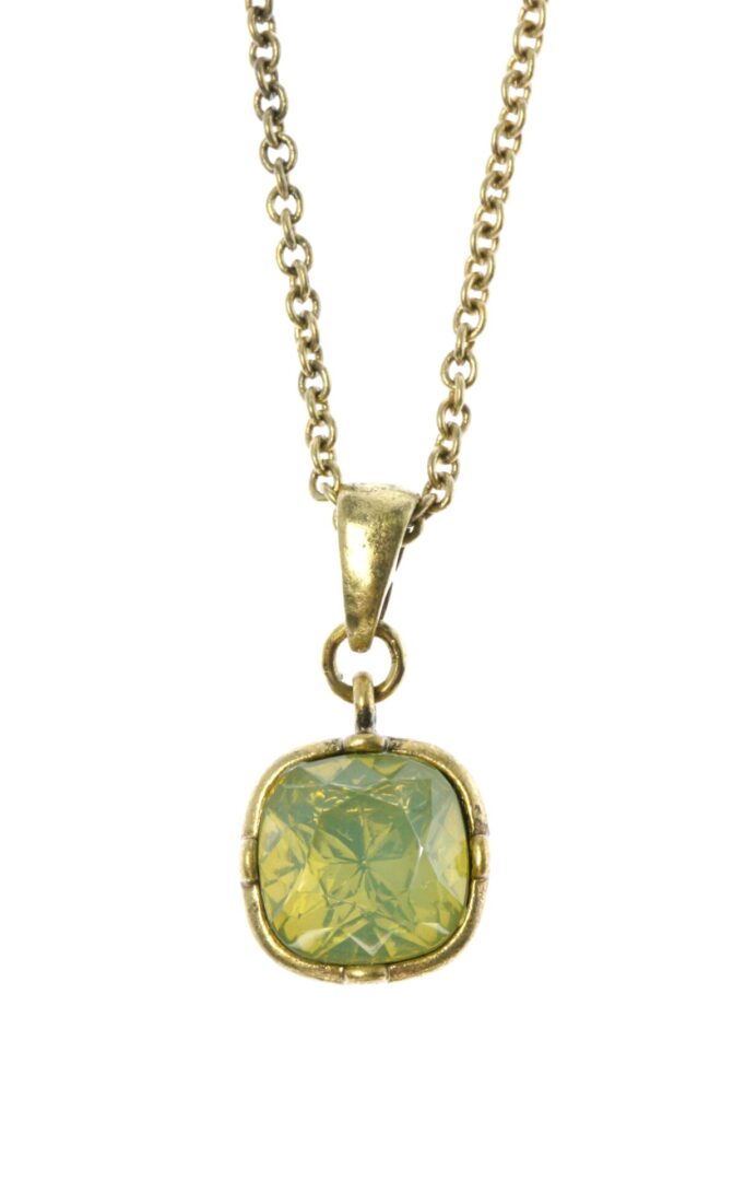 Gold necklace with a square green gemstone pendant.