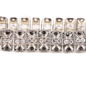 Close-up of a rhinestone-studded silver bracelet.