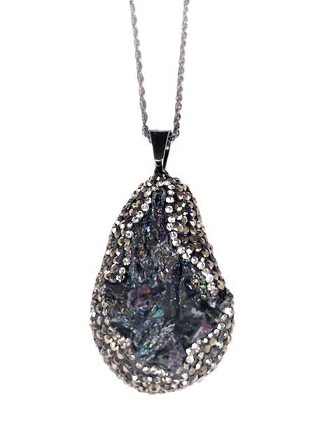 Teardrop pendant with a dark, iridescent stone surrounded by small crystals on a chain.