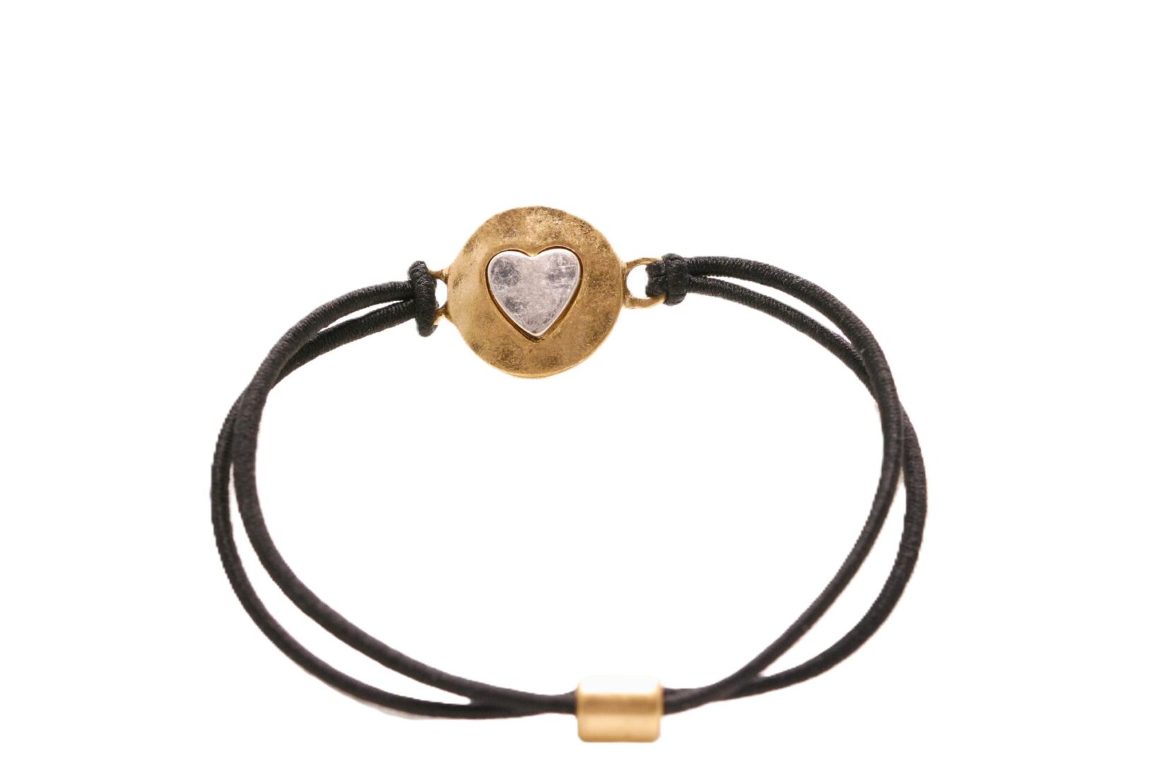 Elegant bracelet with a heart charm on a black cord.