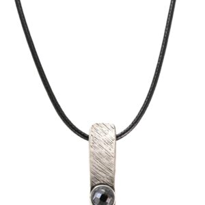 Silver pendant with black stone on black cord necklace.