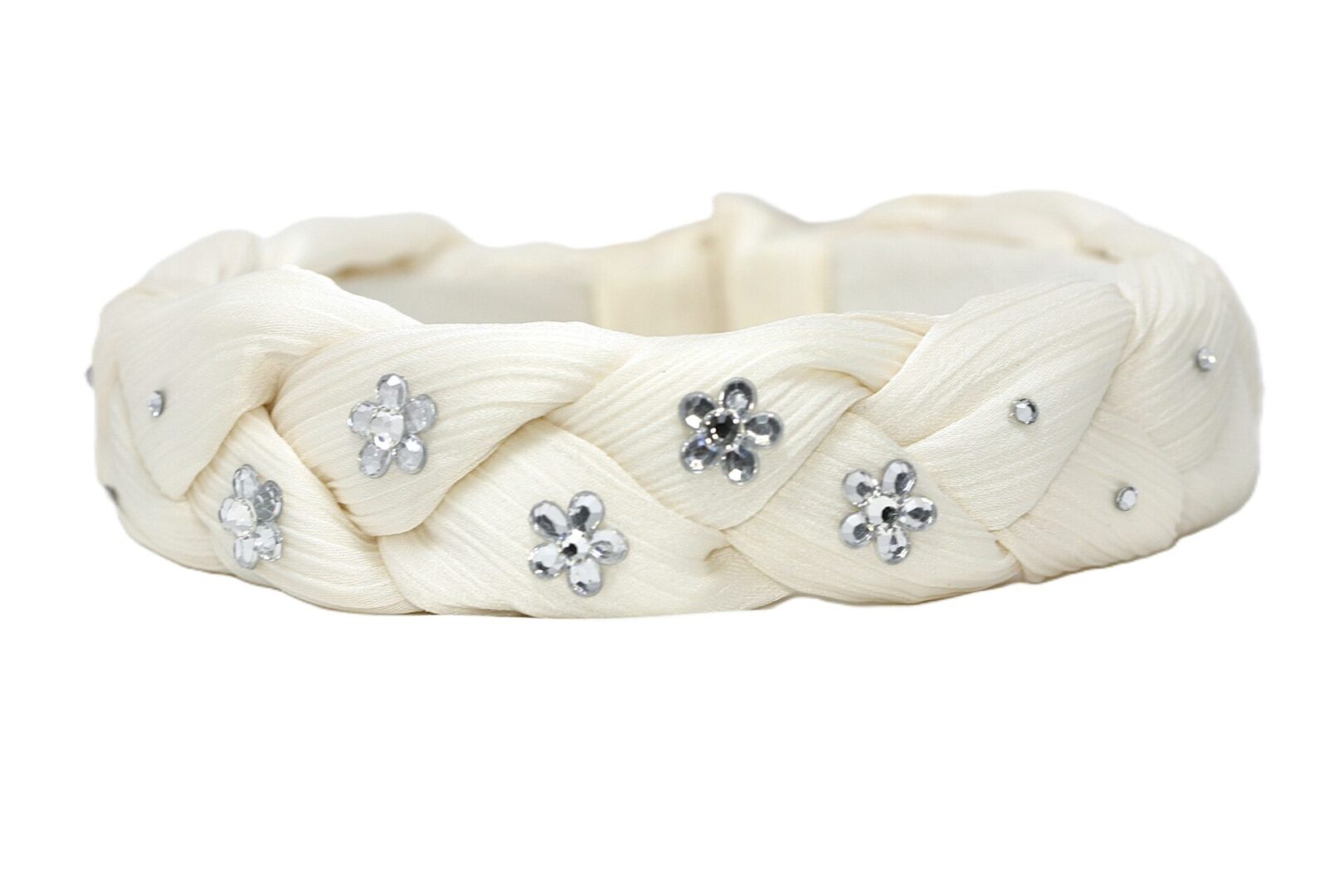 White ceramic bracelet adorned with silver floral decorations.